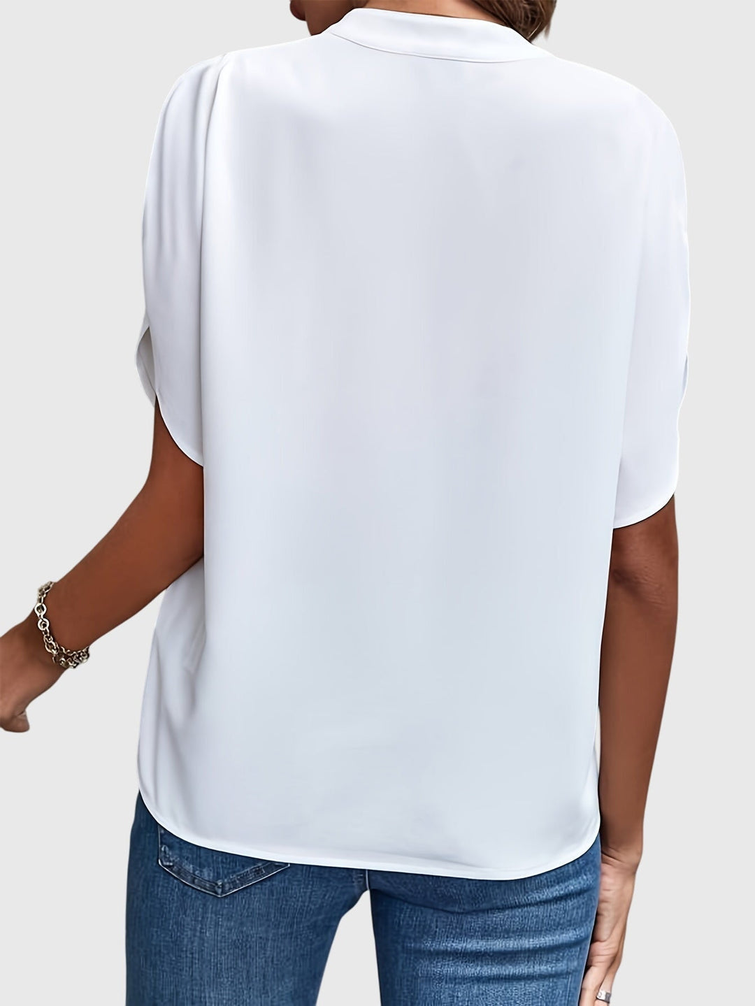 Women’s elegant blouse with tailored fit and timeless silhouette, ideal for office wear, dinners, and casual everyday styling.