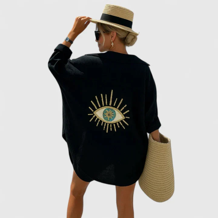 Women’s elegant blouse with embroidered back detailing and a relaxed fit, suitable for summer outfits, casual wear, and vacation styling.