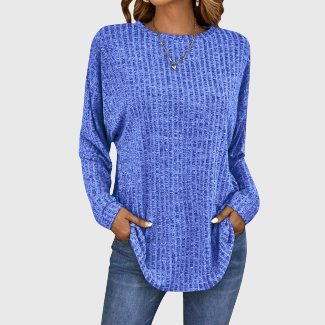 Women’s elegant top with a relaxed fit and flowy silhouette, ideal for office wear, casual outings, and smart-casual styling.