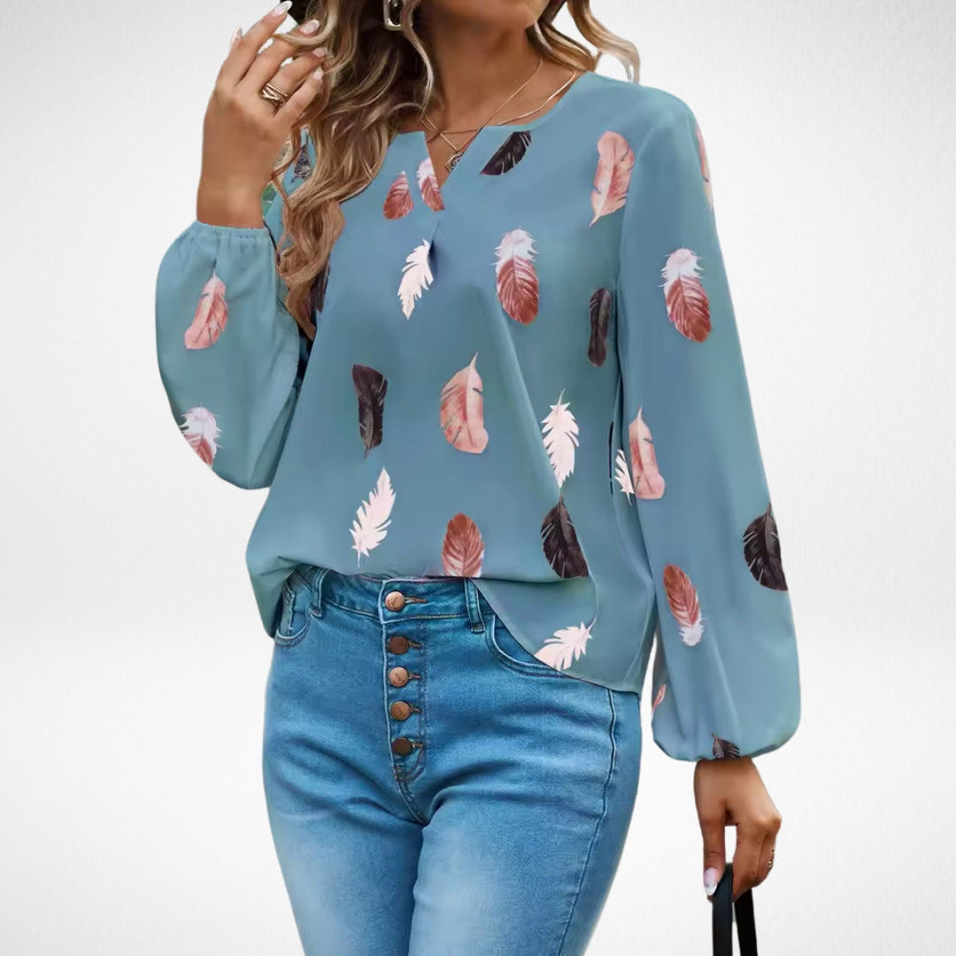 Women’s fit blouse with a timeless silhouette and elegant design, suitable for office outfits, casual wear, and smart occasions.