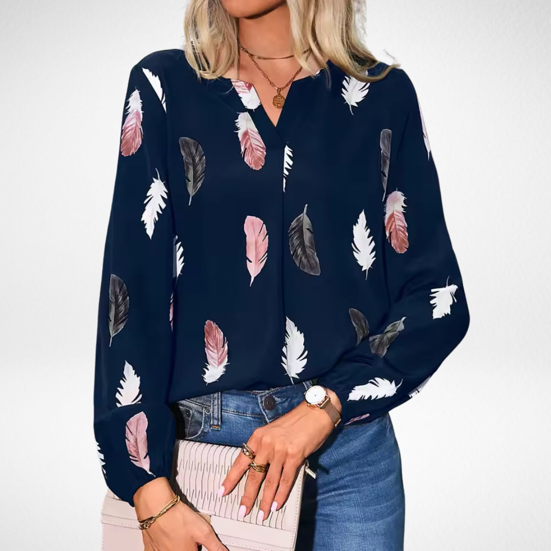 Women’s fit blouse with a timeless silhouette and elegant design, suitable for office outfits, casual wear, and smart occasions.