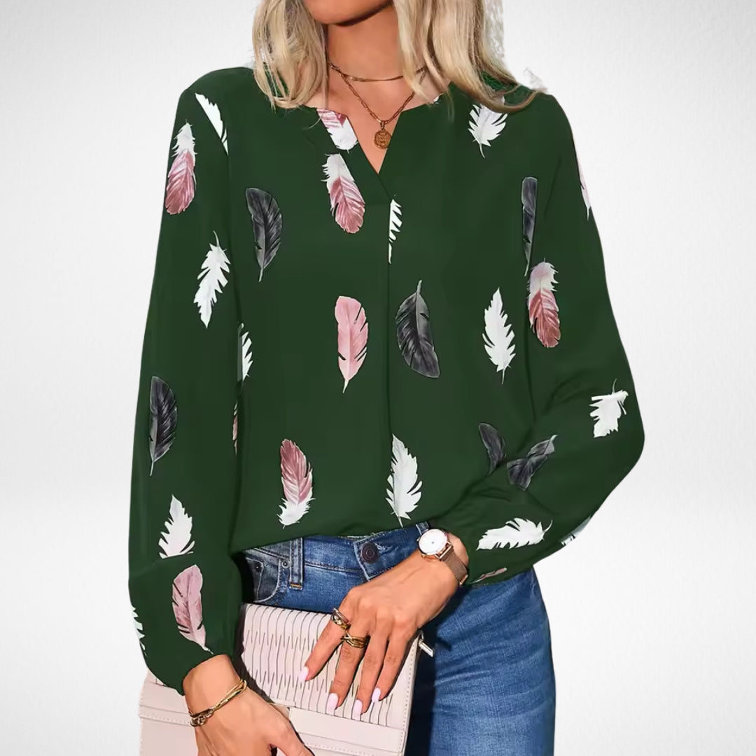 Women’s fit blouse with a timeless silhouette and elegant design, suitable for office outfits, casual wear, and smart occasions.