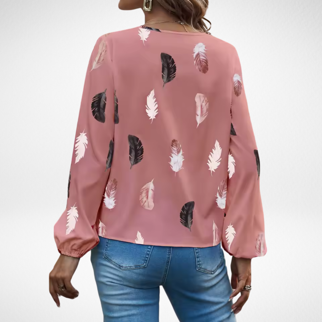 Women’s fit blouse with a timeless silhouette and elegant design, suitable for office outfits, casual wear, and smart occasions.