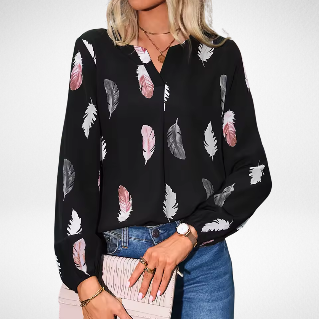 Women’s fit blouse with a timeless silhouette and elegant design, suitable for office outfits, casual wear, and smart occasions.