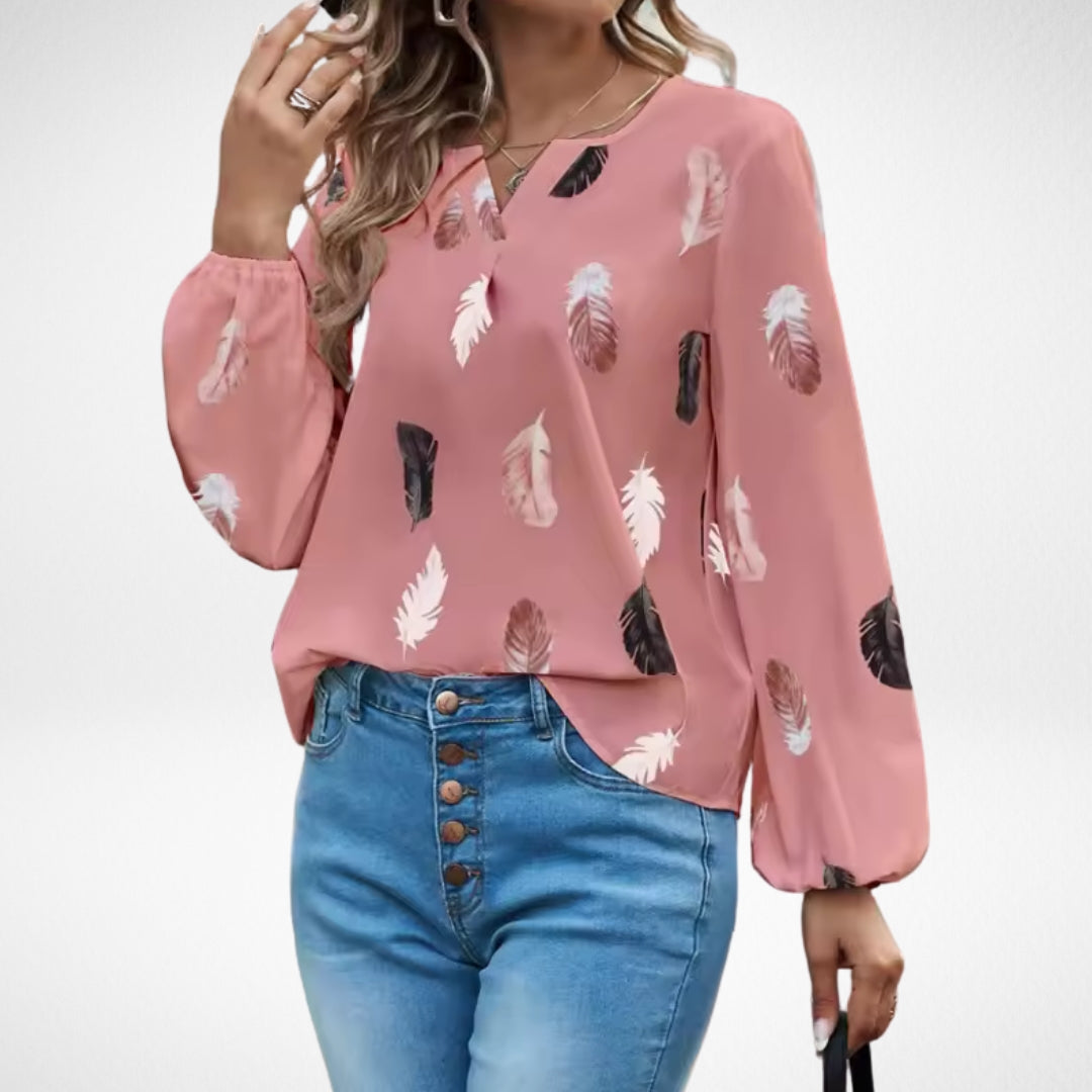 Women’s fit blouse with a timeless silhouette and elegant design, suitable for office outfits, casual wear, and smart occasions.