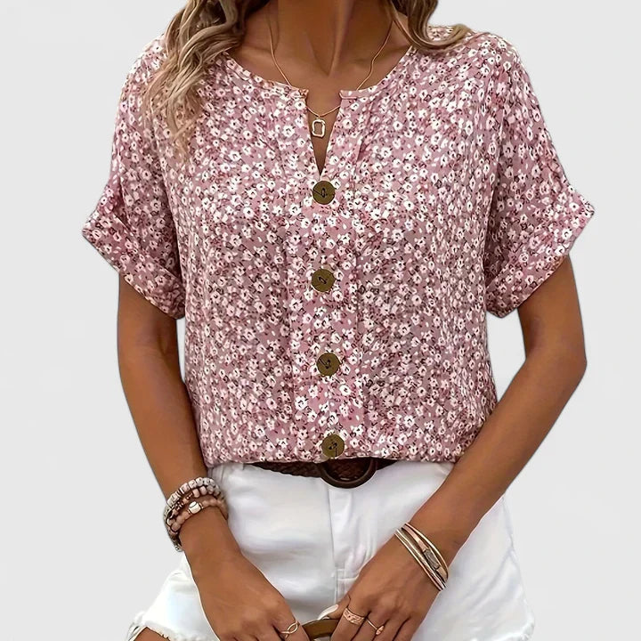 Women’s floral blouse with button-up front and relaxed fit, ideal for office wear, vacations, and casual everyday styling.