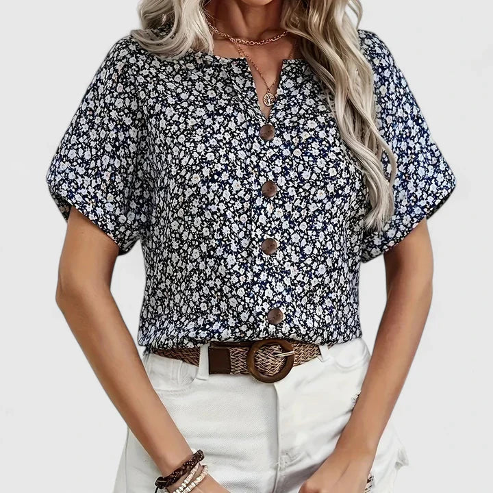 Women’s floral blouse with button-up front and relaxed fit, ideal for office wear, vacations, and casual everyday styling.