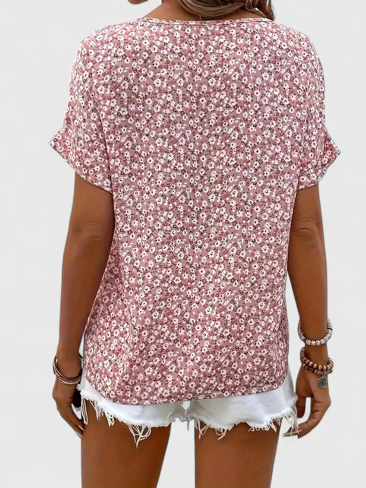 Women’s floral blouse with button-up front and relaxed fit, ideal for office wear, vacations, and casual everyday styling.