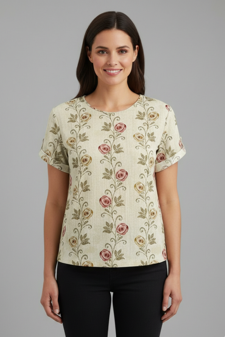 Women’s short sleeve blouse with collared neckline and floral print, featuring a relaxed fit and textured surface for everyday and office wear.