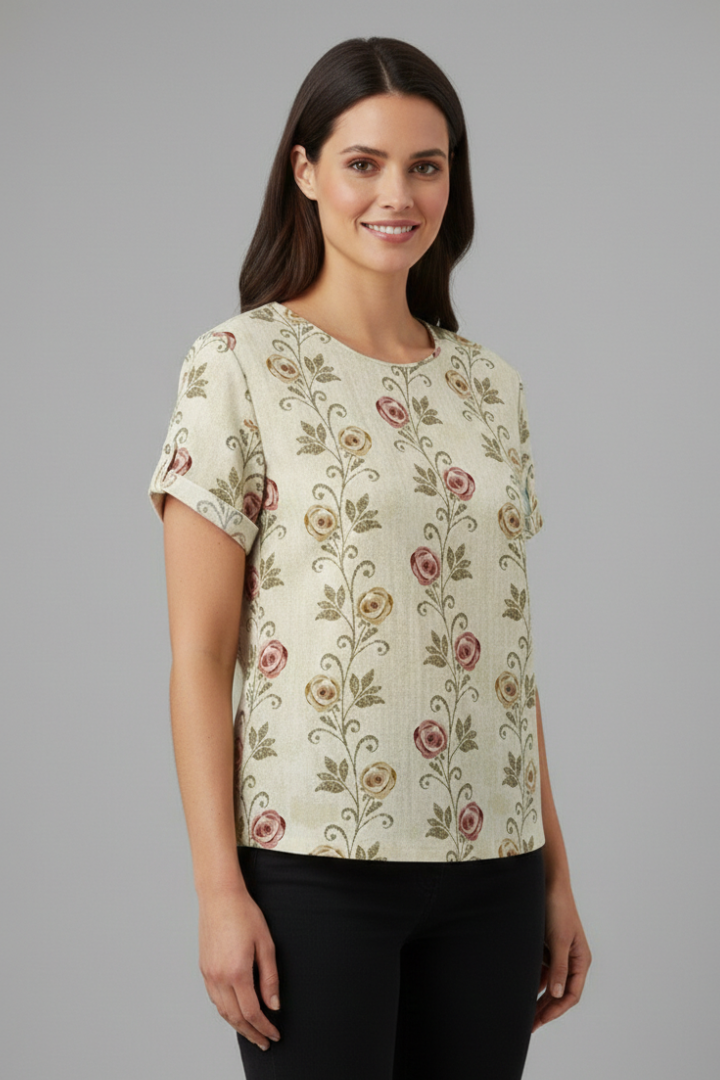 Women’s short sleeve blouse with collared neckline and floral print, featuring a relaxed fit and textured surface for everyday and office wear.
