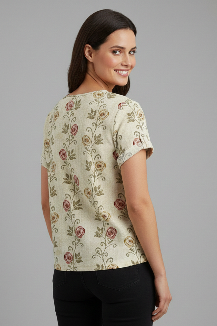 Women’s short sleeve blouse with collared neckline and floral print, featuring a relaxed fit and textured surface for everyday and office wear.