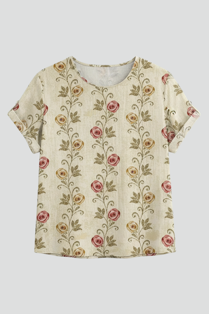 Women’s short sleeve blouse with collared neckline and floral print, featuring a relaxed fit and textured surface for everyday and office wear.