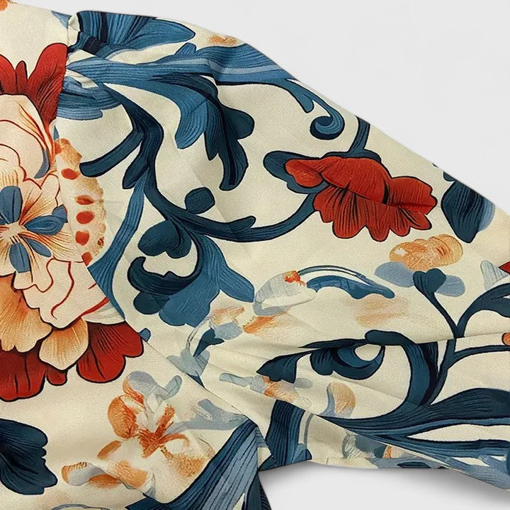 Women’s floral blouse with 3D detailing and a comfortable fit, suitable for casual outfits, elegant events, and everyday styling.