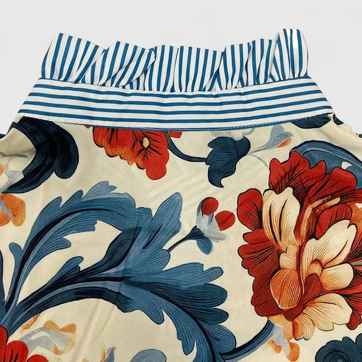 Women’s floral blouse with 3D detailing and a comfortable fit, suitable for casual outfits, elegant events, and everyday styling.