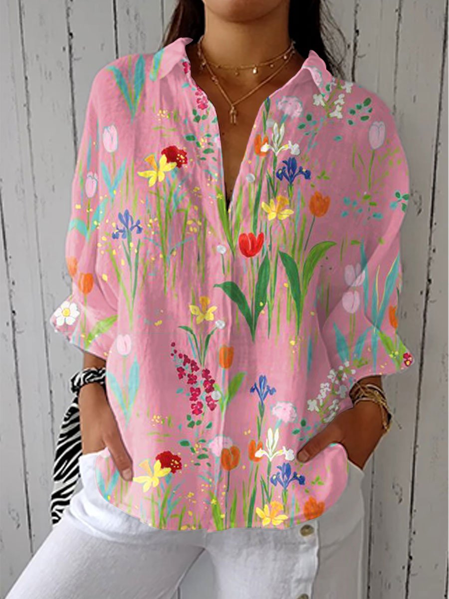 Women’s floral blouse with a button front, v-neck, and relaxed fit, suitable for spring outfits, casual wear, and summer styling.