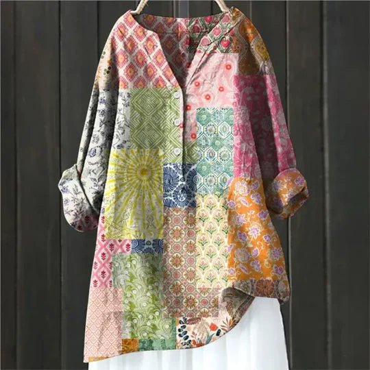 Women’s floral tunic top with button-up front, long sleeves, and relaxed fit, suitable for casual outings, travel, and everyday wear.