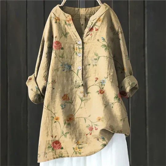Women’s floral tunic top with button-up front, long sleeves, and relaxed fit, suitable for casual outings, travel, and everyday wear.
