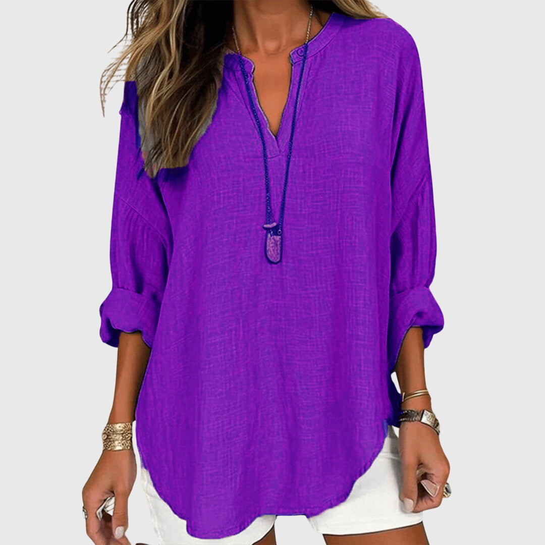 Women’s flowy beach shirt with round neck and long sleeves, ideal for beach vacations, casual summer outfits, and lightweight layering.