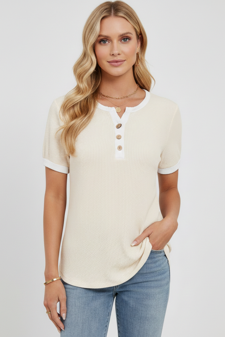 Women’s henley T-shirt with V-neckline, button placket, and ribbed texture, designed for everyday wear and casual outfits.