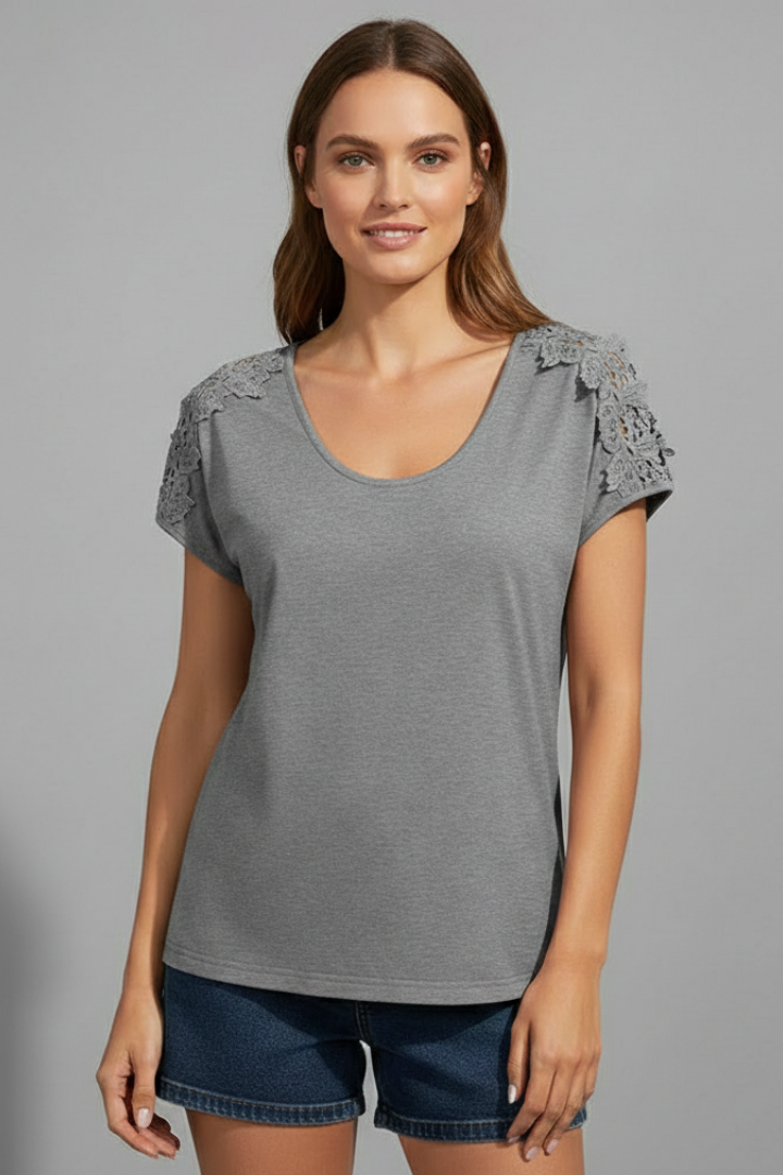 Women’s T-shirt with round neckline and lace shoulder trim, designed for everyday wear and casual outfits.