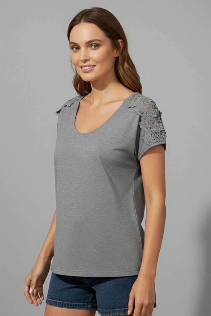 Women’s T-shirt with round neckline and lace shoulder trim, designed for everyday wear and casual outfits.