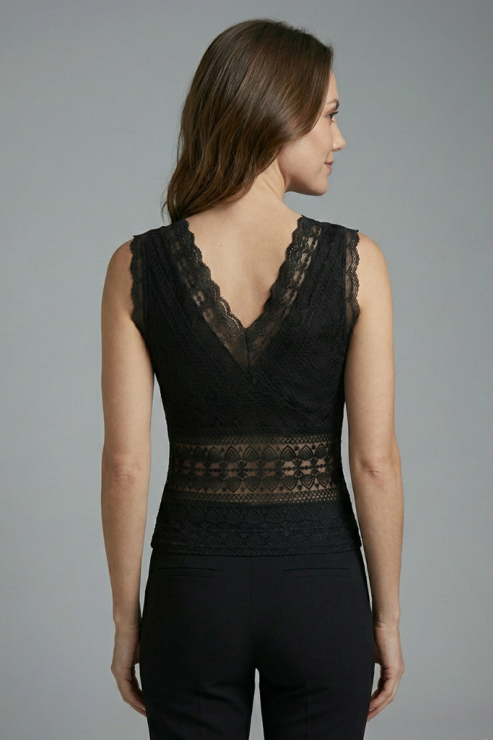 Women’s lace top with v-neckline and wide shoulder straps, designed for casual wear and evening outfits