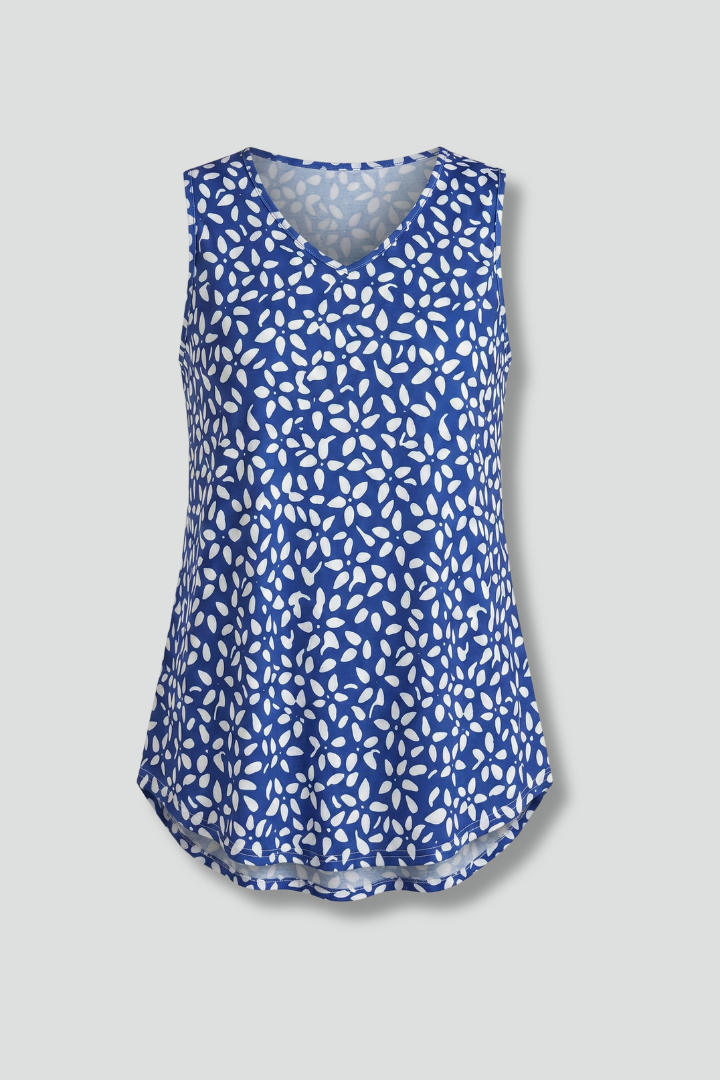 Women’s sleeveless top with V-neckline, wide straps, and leaf print, suitable for casual wear and summer outfits.