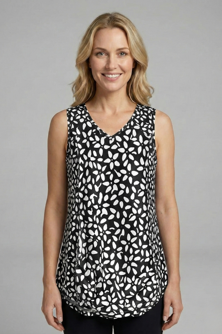 Women’s sleeveless top with V-neckline, wide straps, and leaf print, suitable for casual wear and summer outfits.