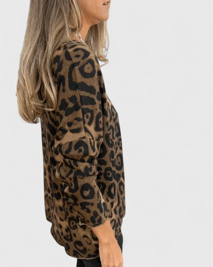 Women’s leopard print top with a relaxed fit and timeless design, ideal for everyday wear, casual outings, travel, and weekend styling.
