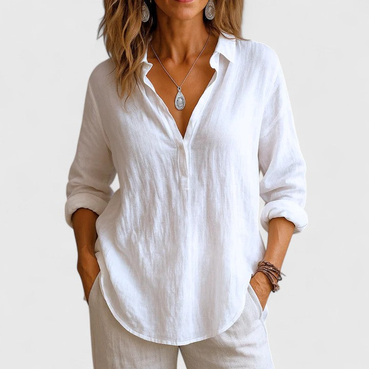 Women’s linen blouse with relaxed fit and timeless silhouette, ideal for vacations, casual outings, and everyday warm-weather styling.