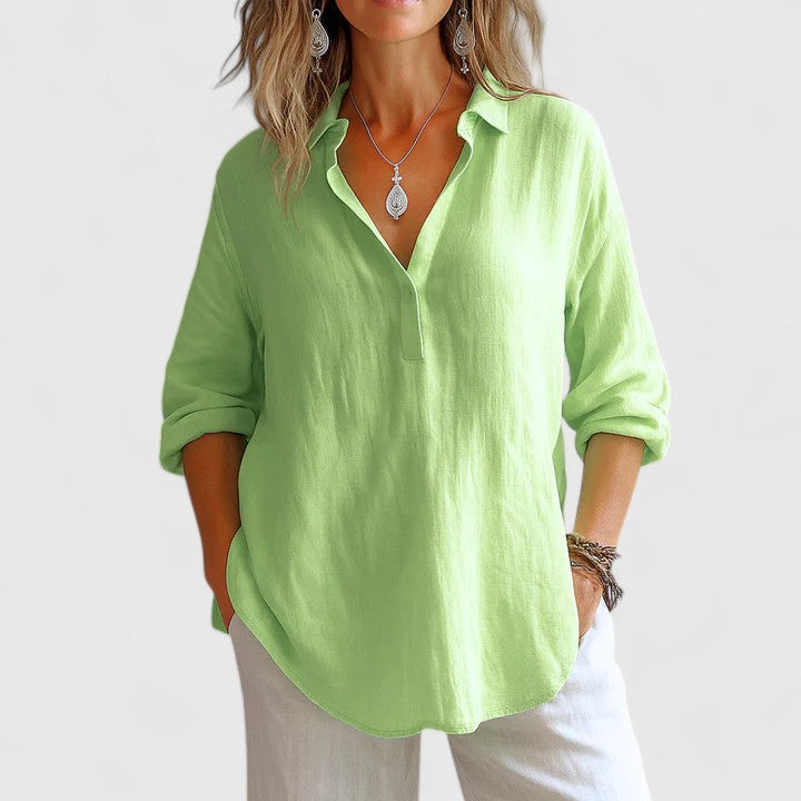 Women’s linen blouse with relaxed fit and timeless silhouette, ideal for vacations, casual outings, and everyday warm-weather styling.