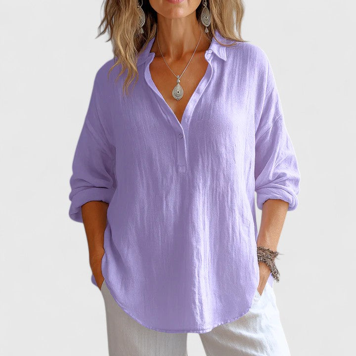 Women’s linen blouse with relaxed fit and timeless silhouette, ideal for vacations, casual outings, and everyday warm-weather styling.