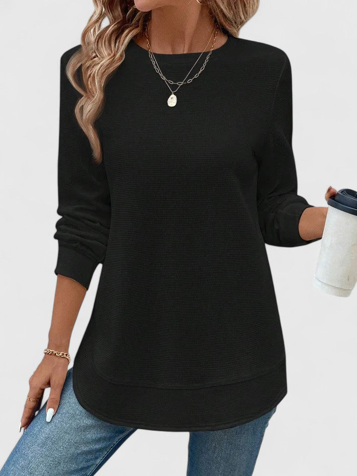 Women’s long sleeve top with an O-neck neckline and relaxed fit, ideal for casual wear, seasonal layering, and everyday styling.
