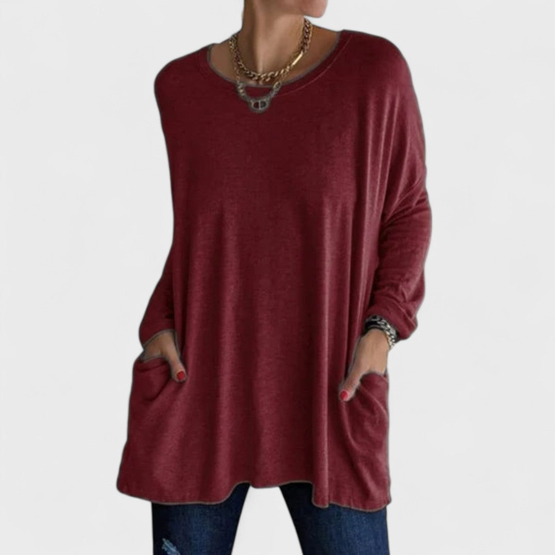 Women’s long sleeve top with a relaxed fit and flattering drape, ideal for everyday wear, layering, casual outings, and versatile styling.