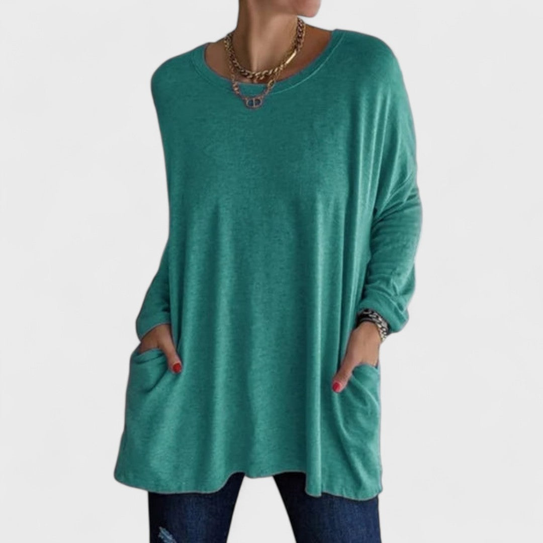 Women’s long sleeve top with a relaxed fit and flattering drape, ideal for everyday wear, layering, casual outings, and versatile styling.