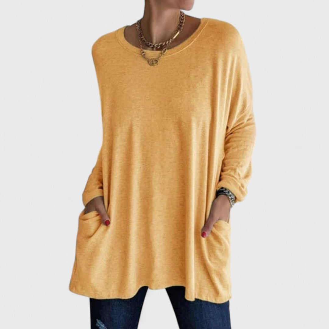 Women’s long sleeve top with a relaxed fit and flattering drape, ideal for everyday wear, layering, casual outings, and versatile styling.