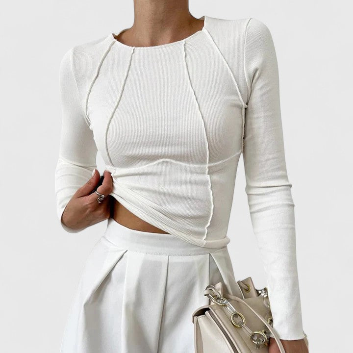 Women’s long sleeve top with a sculpted fit and timeless design, ideal for everyday wear, office outfits, and casual occasions.