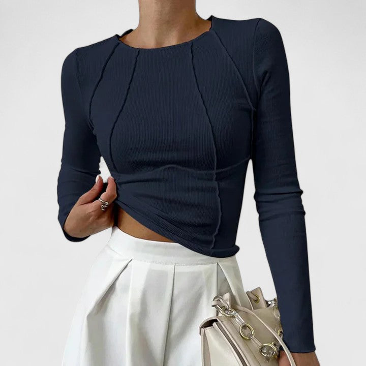 Women’s long sleeve top with a sculpted fit and timeless design, ideal for everyday wear, office outfits, and casual occasions.