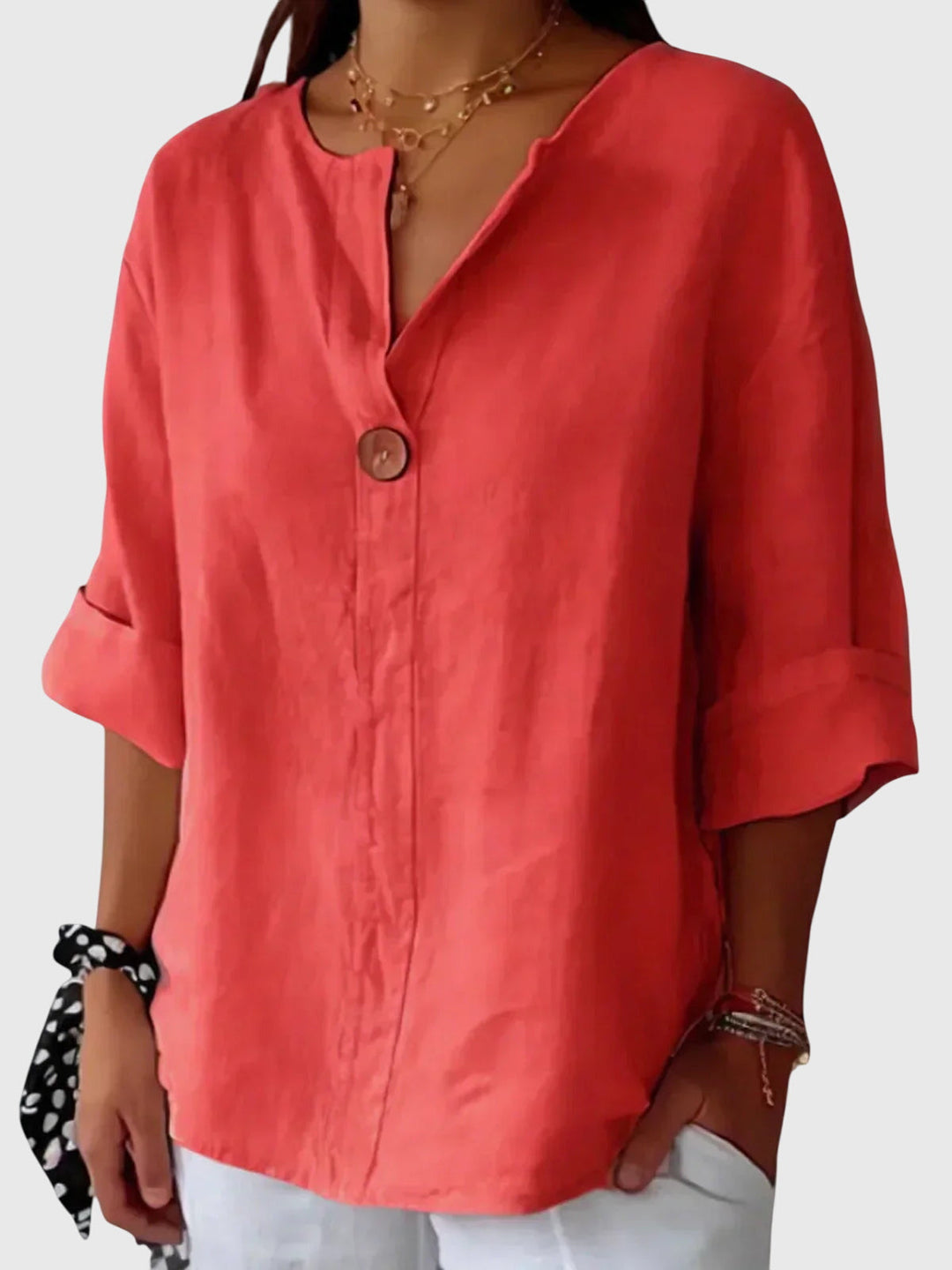 Women’s loose fit blouse with an elegant silhouette and comfortable design, ideal for casual wear, office outfits, and smart occasions.
