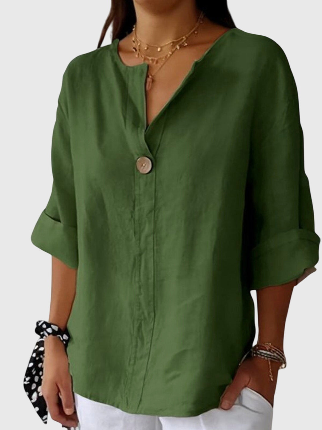 Women’s loose fit blouse with an elegant silhouette and comfortable design, ideal for casual wear, office outfits, and smart occasions.