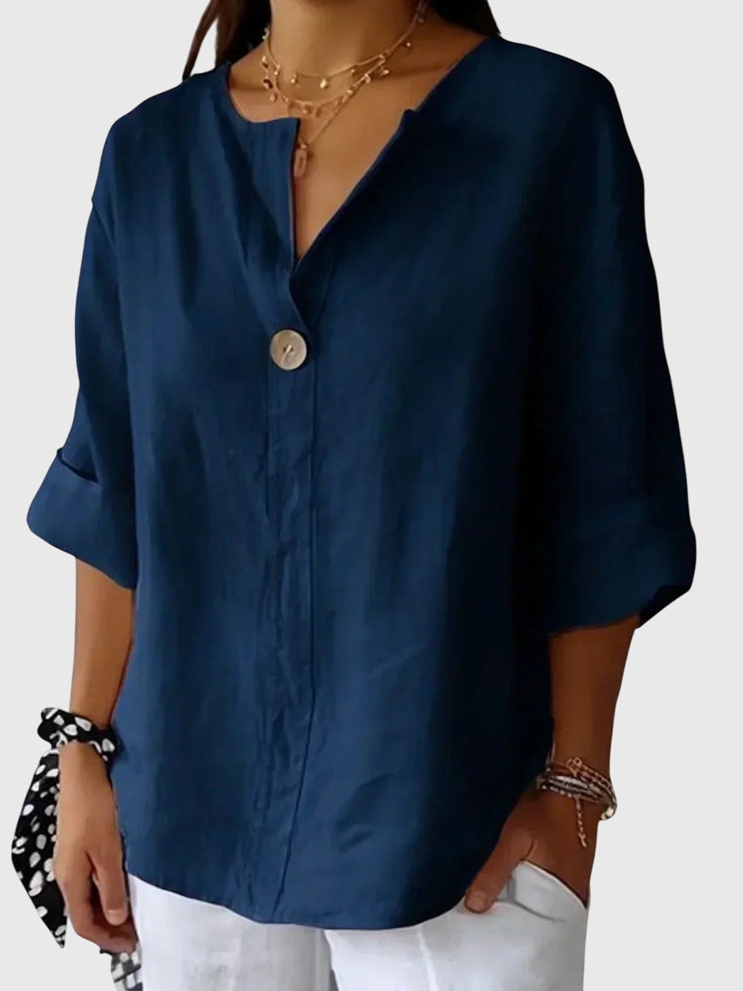 Women’s loose fit blouse with an elegant silhouette and comfortable design, ideal for casual wear, office outfits, and smart occasions.
