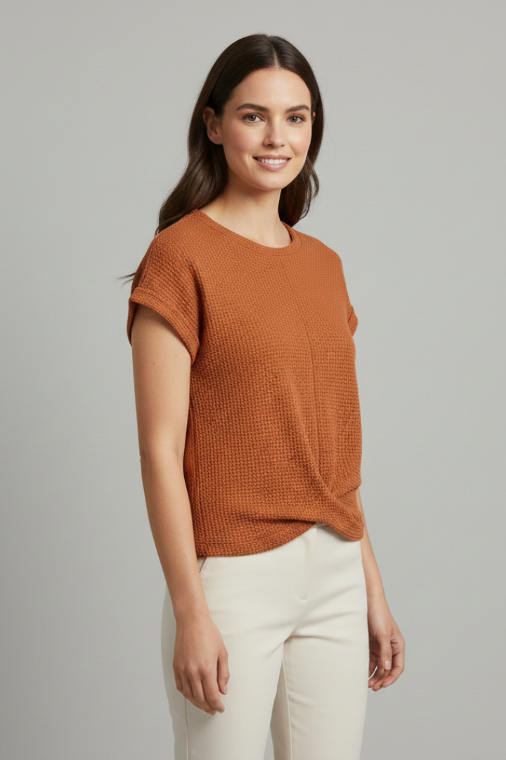 Women’s loose-fit T-shirt with boat neckline and textured finish, designed for everyday comfort and casual styling.