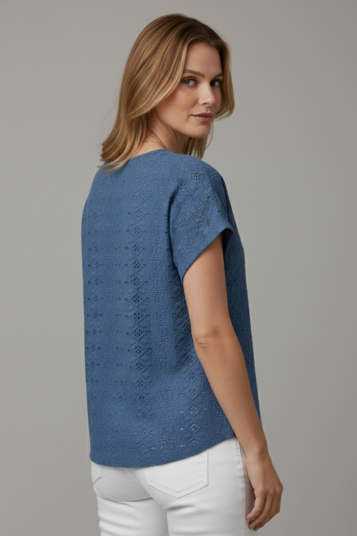 Women’s T-shirt with notched neckline and eyelet surface detailing, designed for casual wear and everyday outfits.