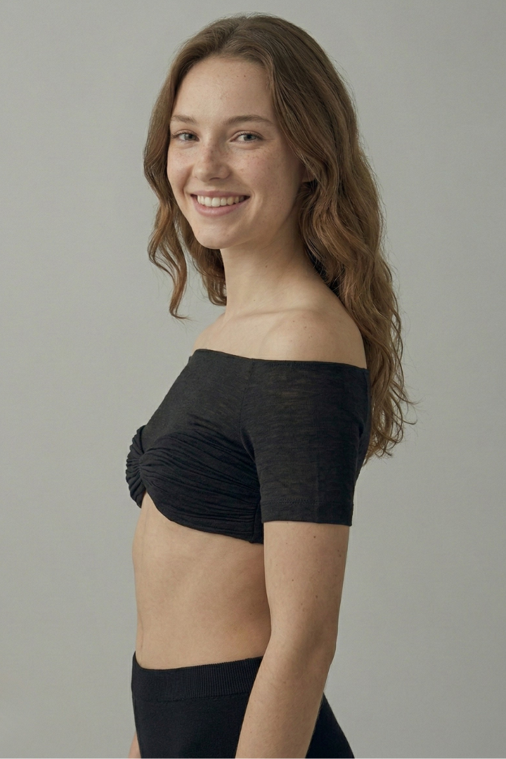 Women’s off-shoulder crop top with front ruching and short sleeves, ideal for summer outfits and casual evening styling.