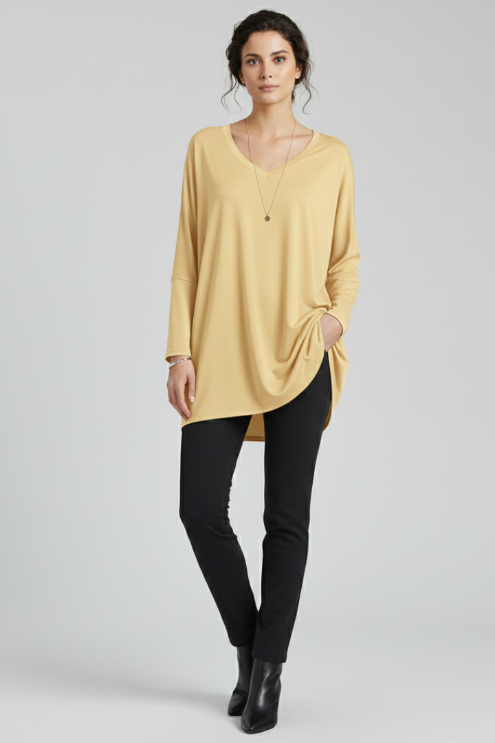Women’s oversized V-neck shirt with long sleeves, designed for casual wear and versatile everyday outfits