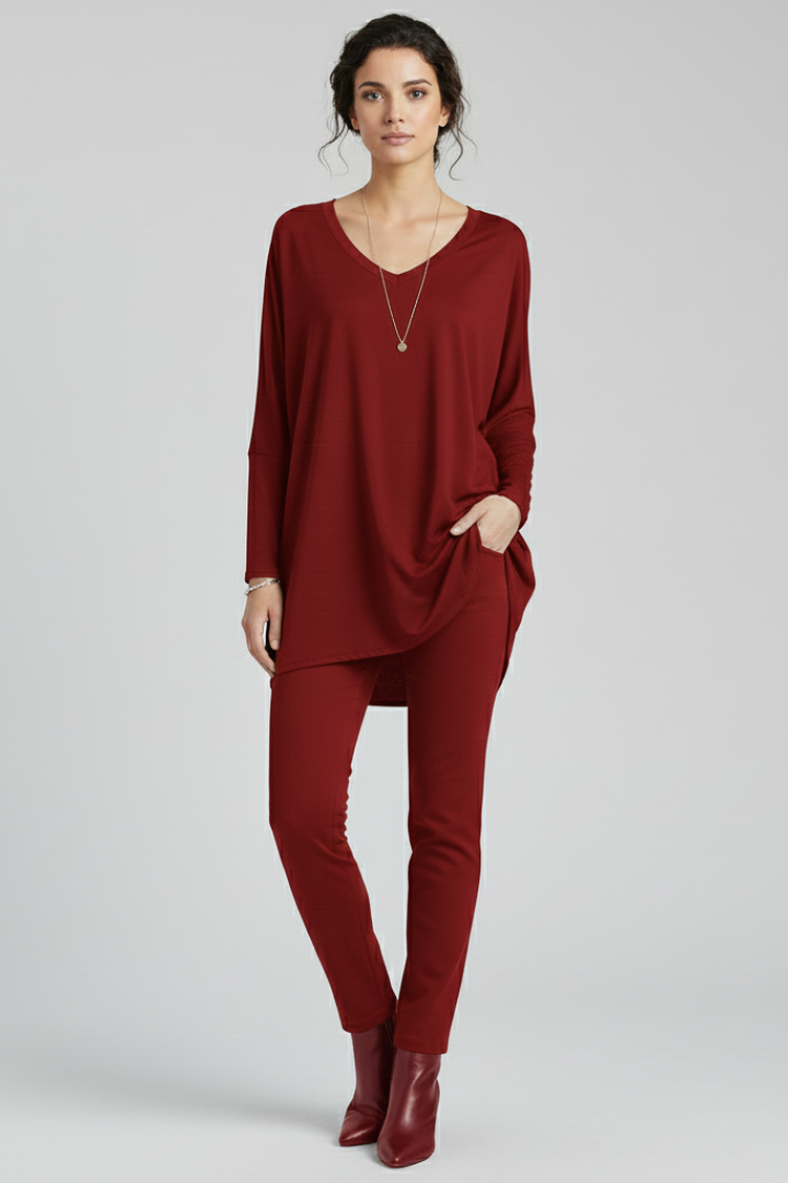 Women’s oversized V-neck shirt with long sleeves, designed for casual wear and versatile everyday outfits