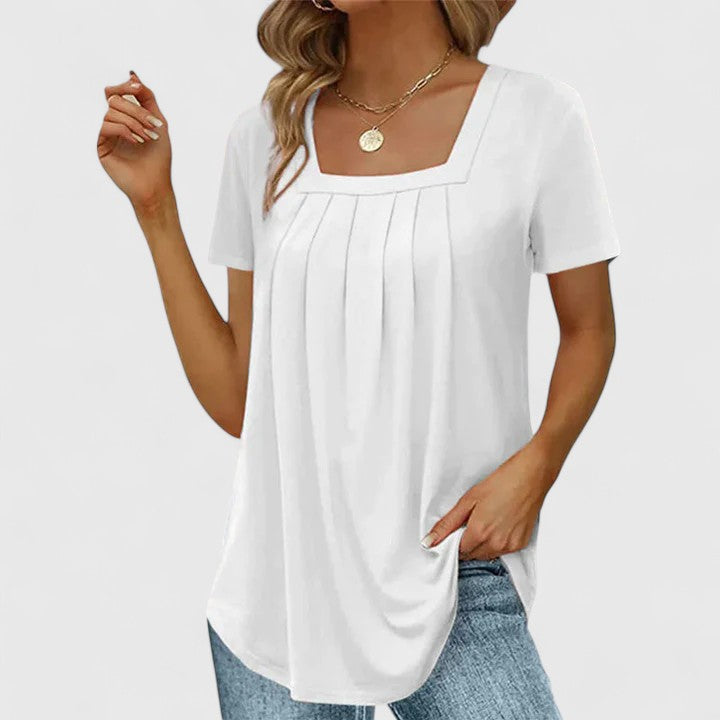 Women’s pleated blouse with a square neckline and relaxed fit, ideal for summer outfits, office wear, and smart casual occasions.