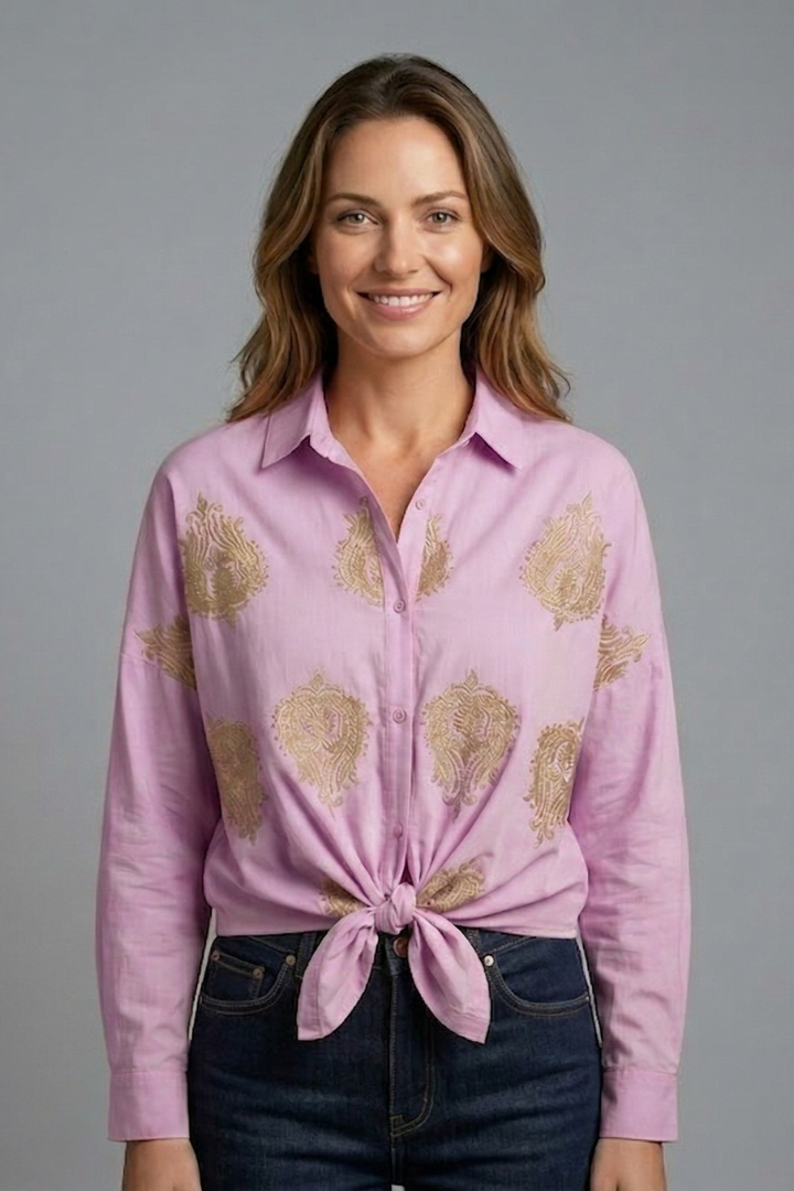 Women’s printed blouse with open neckline, button front, and long sleeves, ideal for office outfits and casual everyday styling.