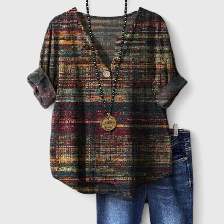 Women’s printed blouse with V-neckline and three-quarter sleeves, ideal for office wear, dinners, and casual everyday styling.