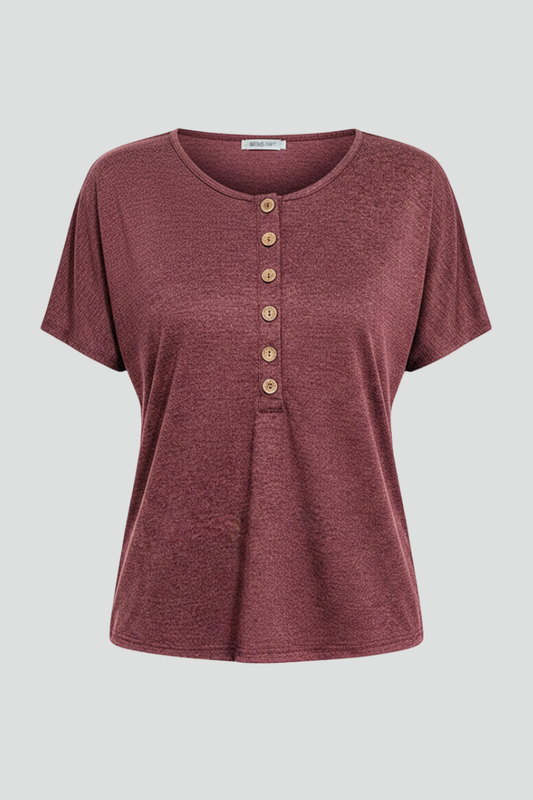 Women’s ribbed T-shirt with round neckline, button placket, and tie-front hem, suitable for everyday wear and casual outfits.